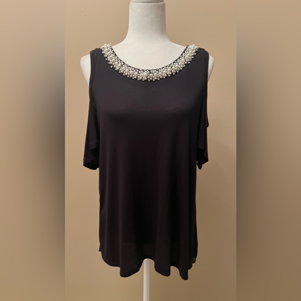 Cold shoulder too with pearl collar accent